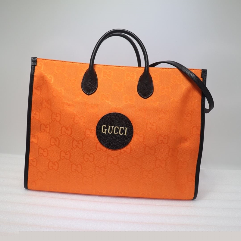 G*u*i shopping bags
